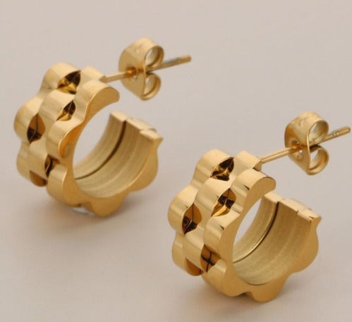 Aretes gold gear