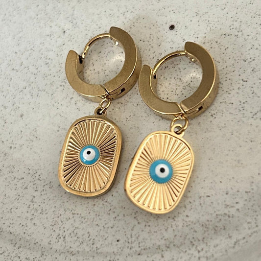 Aretes ovalados ojo azul cielo